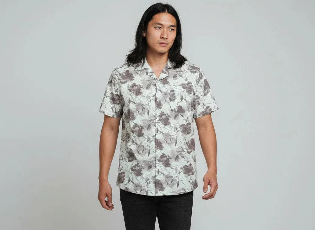 Man wearing a short-sleeve floral shirt from ArokaLife New Zealand fashion collection
