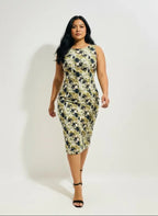 Confident woman in form-fitting printed midi dress and black heels, ArokaLife fashion style